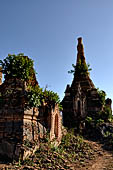 Inle Lake Myanmar. Indein, a cluster of ancient stupas  ruined and overgrown with bushes, just behind the village.